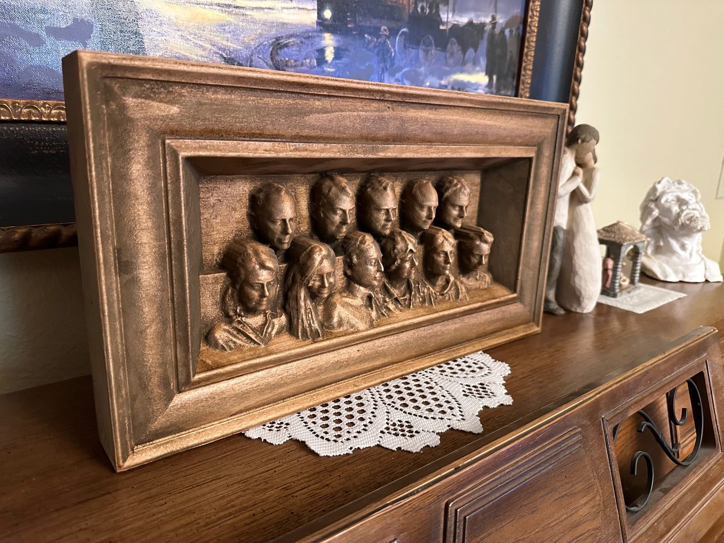 Carved Family Portrait on a Piano top