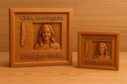 Two wooden plaques with engraved portraits and text on a wooden surface