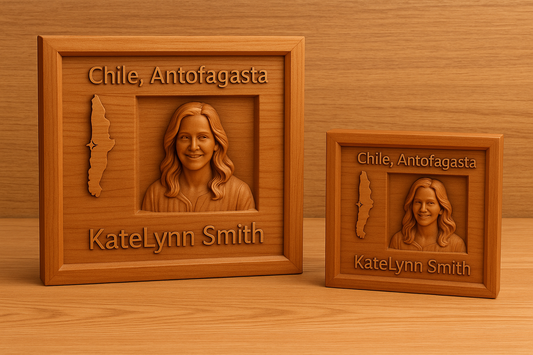 Two wooden plaques with engraved portraits and text on a wooden surface