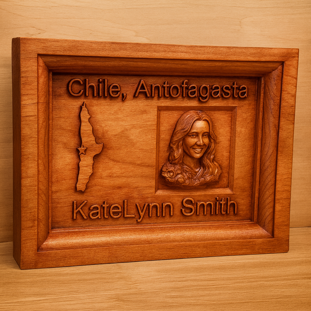 Wooden plaque with engraved map of Chile, Antofagasta, and a bust of a person named KateLynn Smith.